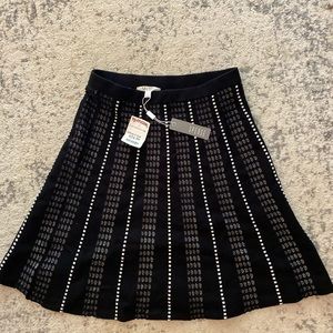 Cute skirt — very flattering and never worn!